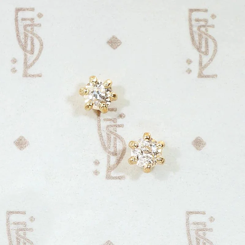 Pretty .66tcw Vintage Diamond Studs in Gold