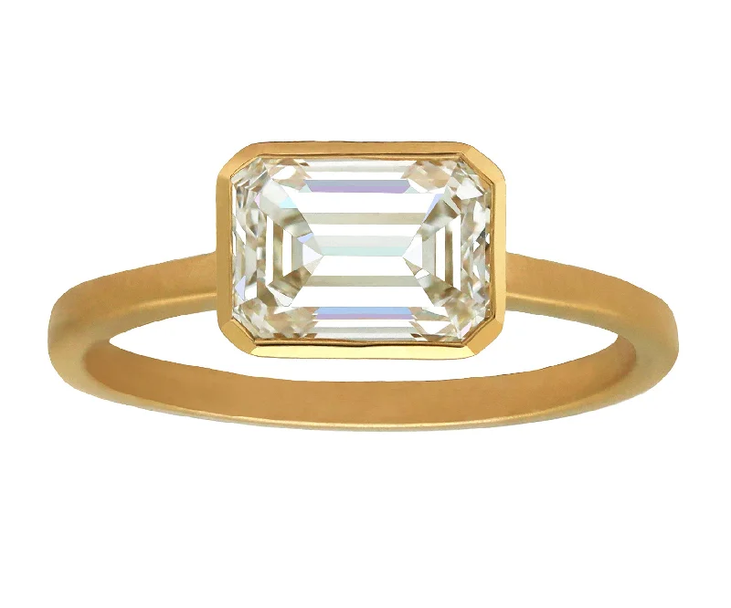 1.50ct Emerald Cut Diamond Set East-West in Gold Bezel Ring