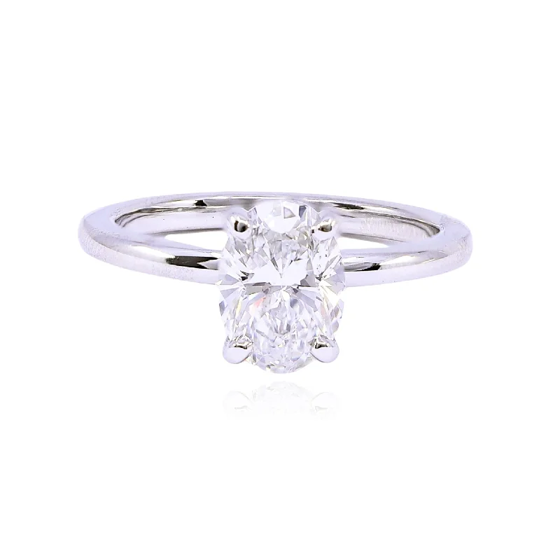 ESTATE PLATINUM OVAL SOLITAIRE DIAMOND RING - 1.60CT