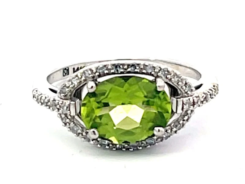 Oval Green Peridot and Diamond Halo Ring in 14k White Gold