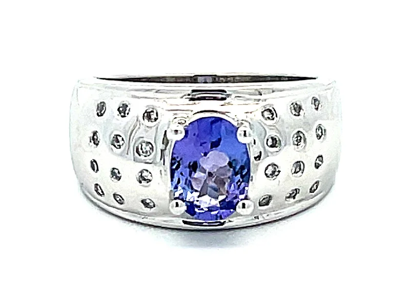 Oval Tanzanite and Diamond Studded Wide Dome Ring in Platinum